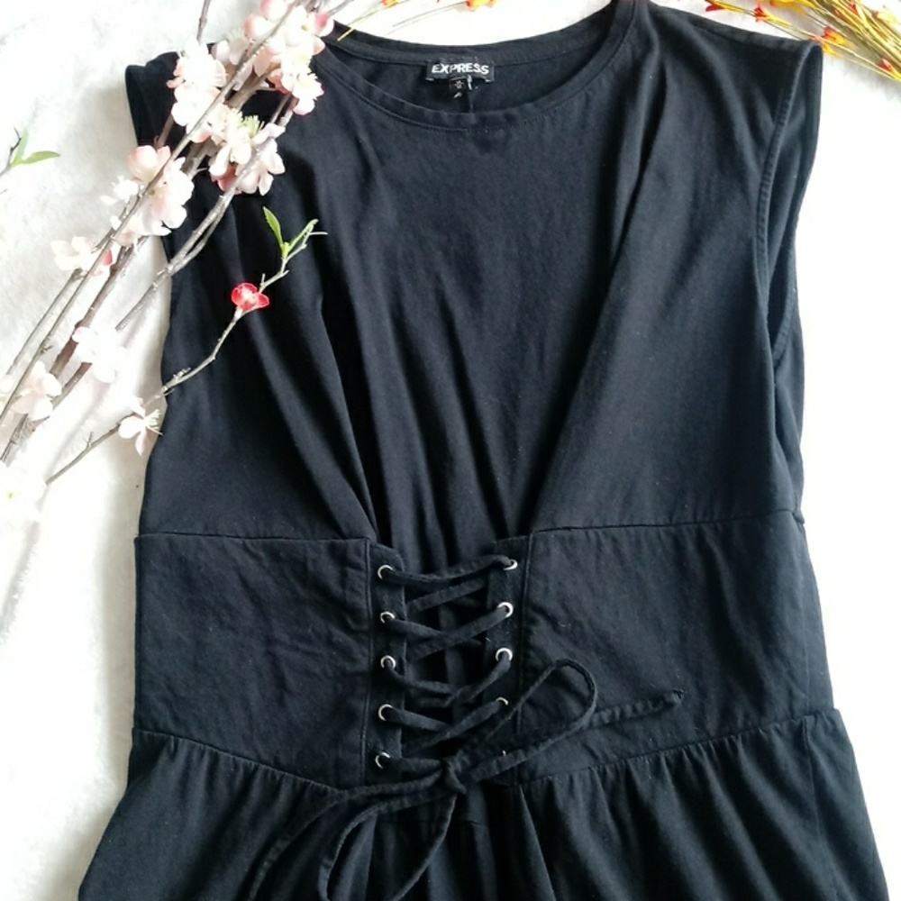 Black top with corset detail in mid